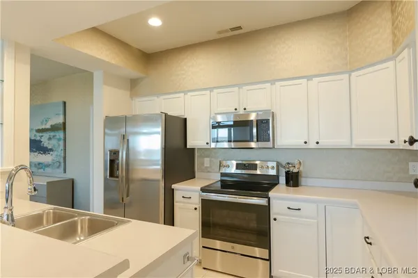 $475,000 | 62 Evergreen Condo Drive, Unit 1A, Sunrise Beach, MO 65079