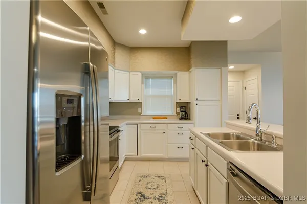 $475,000 | 62 Evergreen Condo Drive, Unit 1A, Sunrise Beach, MO 65079