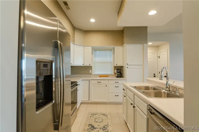 $499,000 | 62 Evergreen Condo Drive, Unit 1A, Sunrise Beach, MO 65079