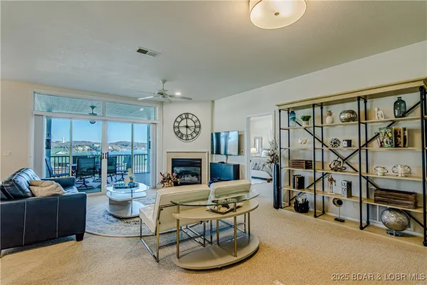 $475,000 | 62 Evergreen Condo Drive, Unit 1A, Sunrise Beach, MO 65079