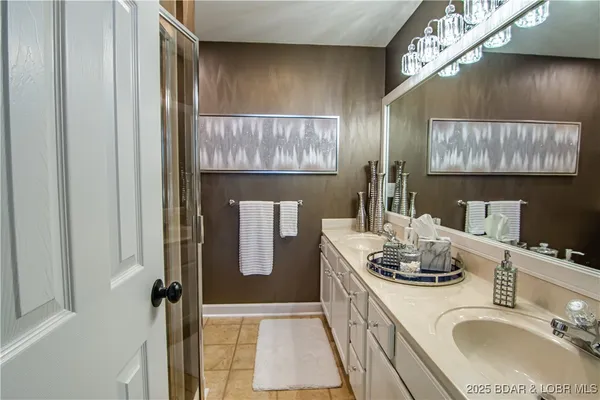 $475,000 | 62 Evergreen Condo Drive, Unit 1A, Sunrise Beach, MO 65079