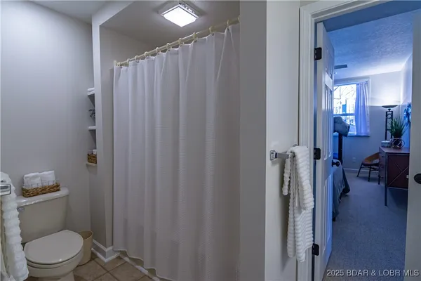 $475,000 | 62 Evergreen Condo Drive, Unit 1A, Sunrise Beach, MO 65079