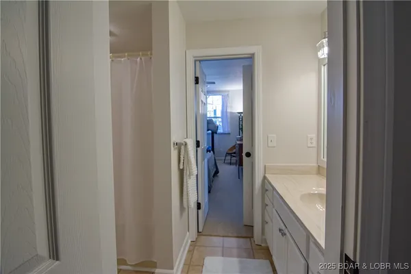$475,000 | 62 Evergreen Condo Drive, Unit 1A, Sunrise Beach, MO 65079