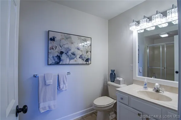 $475,000 | 62 Evergreen Condo Drive, Unit 1A, Sunrise Beach, MO 65079