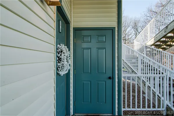 $475,000 | 62 Evergreen Condo Drive, Unit 1A, Sunrise Beach, MO 65079