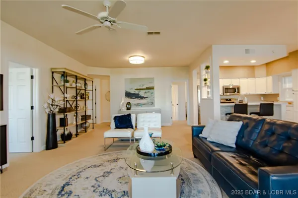 $475,000 | 62 Evergreen Condo Drive, Unit 1A, Sunrise Beach, MO 65079