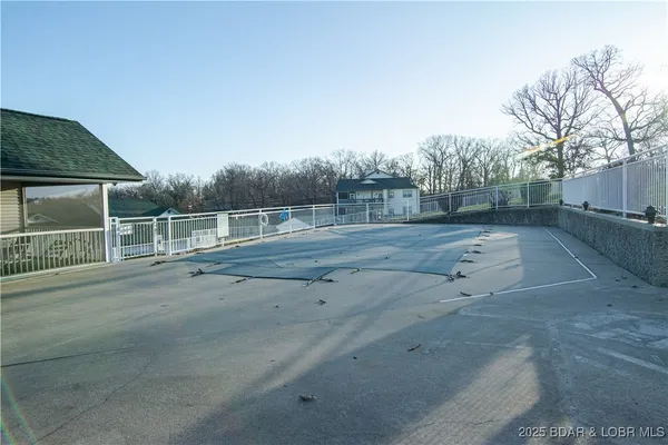 $475,000 | 62 Evergreen Condo Drive, Unit 1A, Sunrise Beach, MO 65079