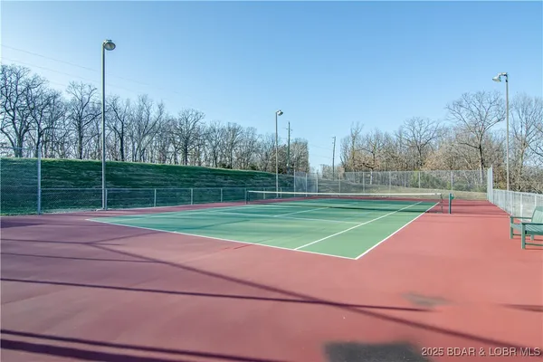 $475,000 | 62 Evergreen Condo Drive, Unit 1A, Sunrise Beach, MO 65079