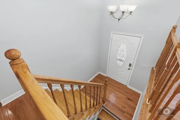 a view of a hallway with front door