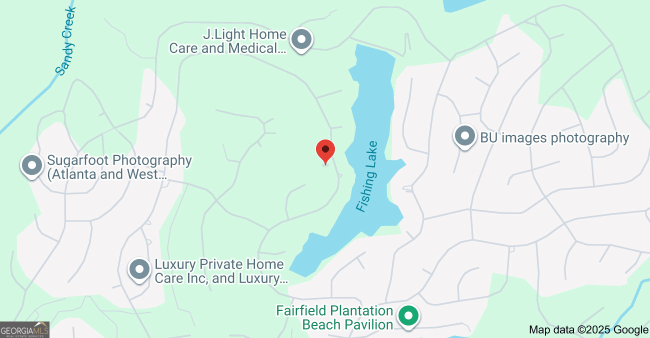 7298 Tara Drive Villa Rica, GA 30180 - Photo 2 of 2 a view of a book and a white wall