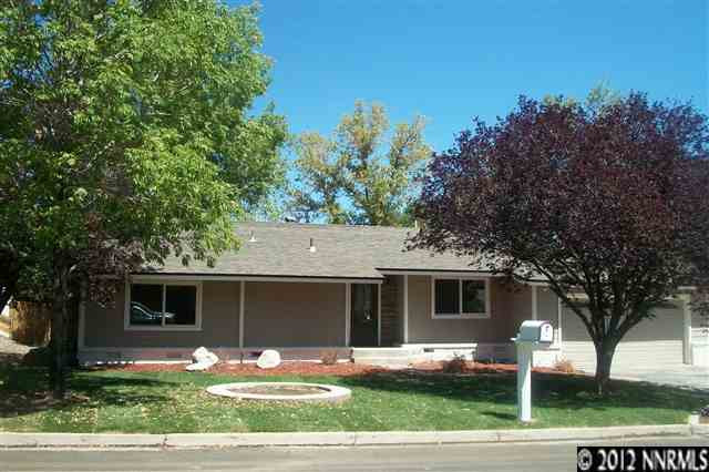 645 Sapphire Circle Reno, NV 89509 - Photo 1 of 1 a front view of a house with garden