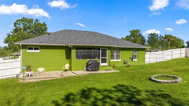 a swimming pool with wooden fence
