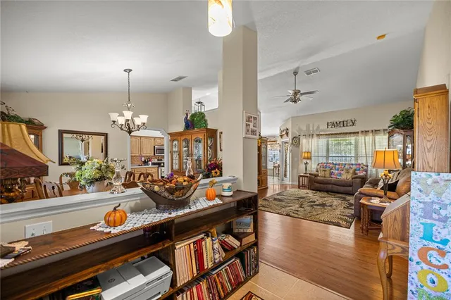 a view of a living room and dining room