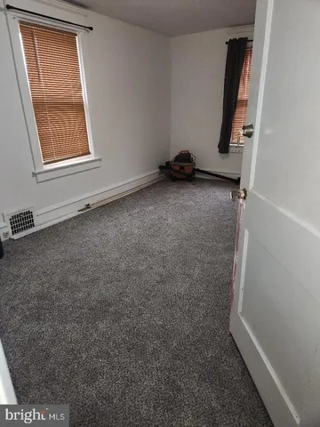 an empty room with a door