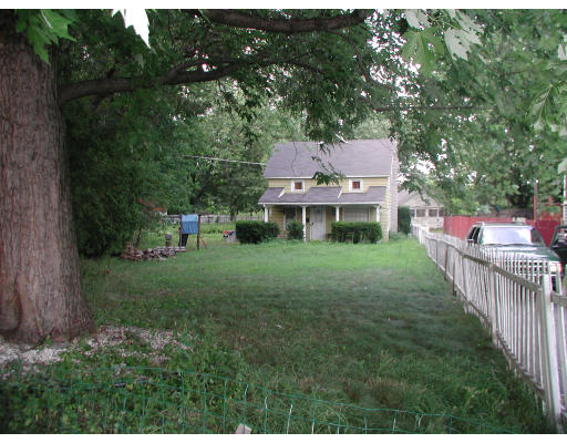 311 Allen Street Springfield, MA 01108 - Photo 2 of 2 a view of a house with backyard and sitting area