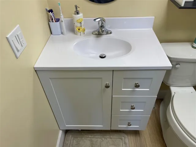 a bedroom with bed and a flat screen tv