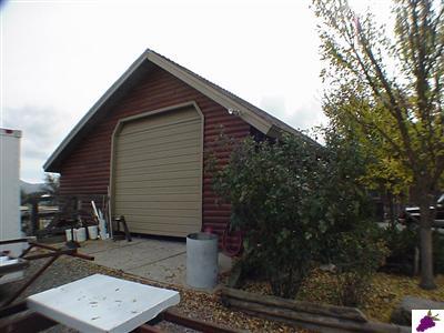 13794 Millerton Road Prather, CA 93651 - Photo 13 of 14 Rear of shop.Has 2 interior rooms and 2 car garage + large door for RV. Plenty of storage too!