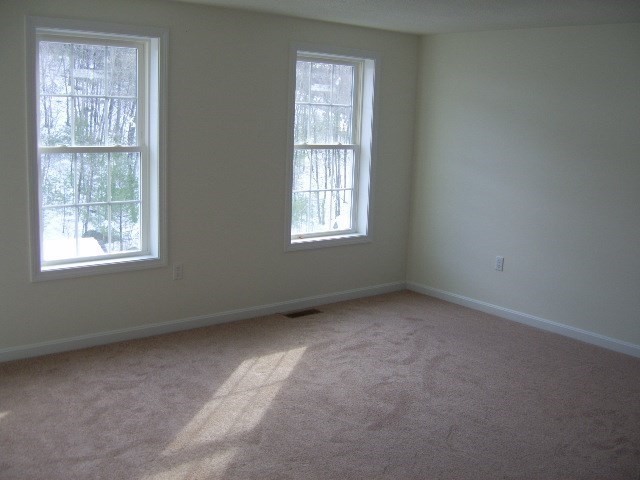 5 Bufton Farm Road, Unit 7 Clinton, MA 01510 - Photo 11 of 22 an empty room with windows