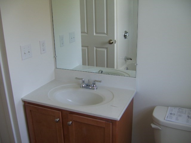 5 Bufton Farm Road, Unit 7 Clinton, MA 01510 - Photo 16 of 22 a bathroom with a sink and a toilet