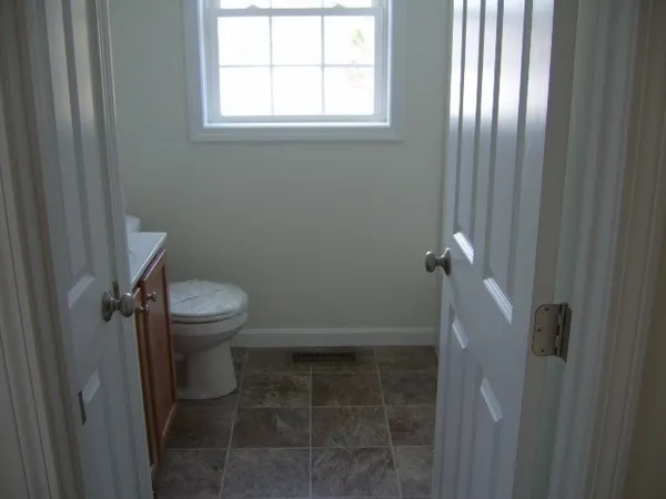 a kitchen with a sink stove and microwave