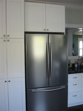 4 Spring Lane Stoneham, MA 02180 - Photo 5 of 13 a view of a refrigerator in kitchen