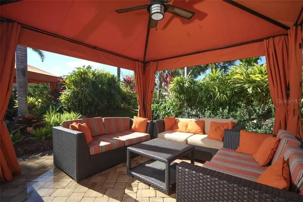 a outdoor living space with furniture and garden view