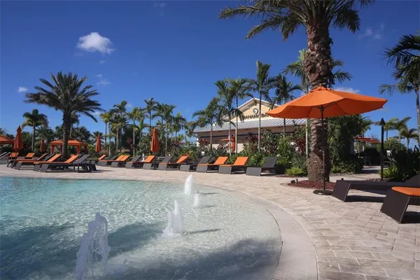 a view of a chairs and tables in the patio