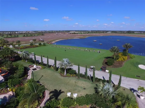an aerial view of a house with outdoor space