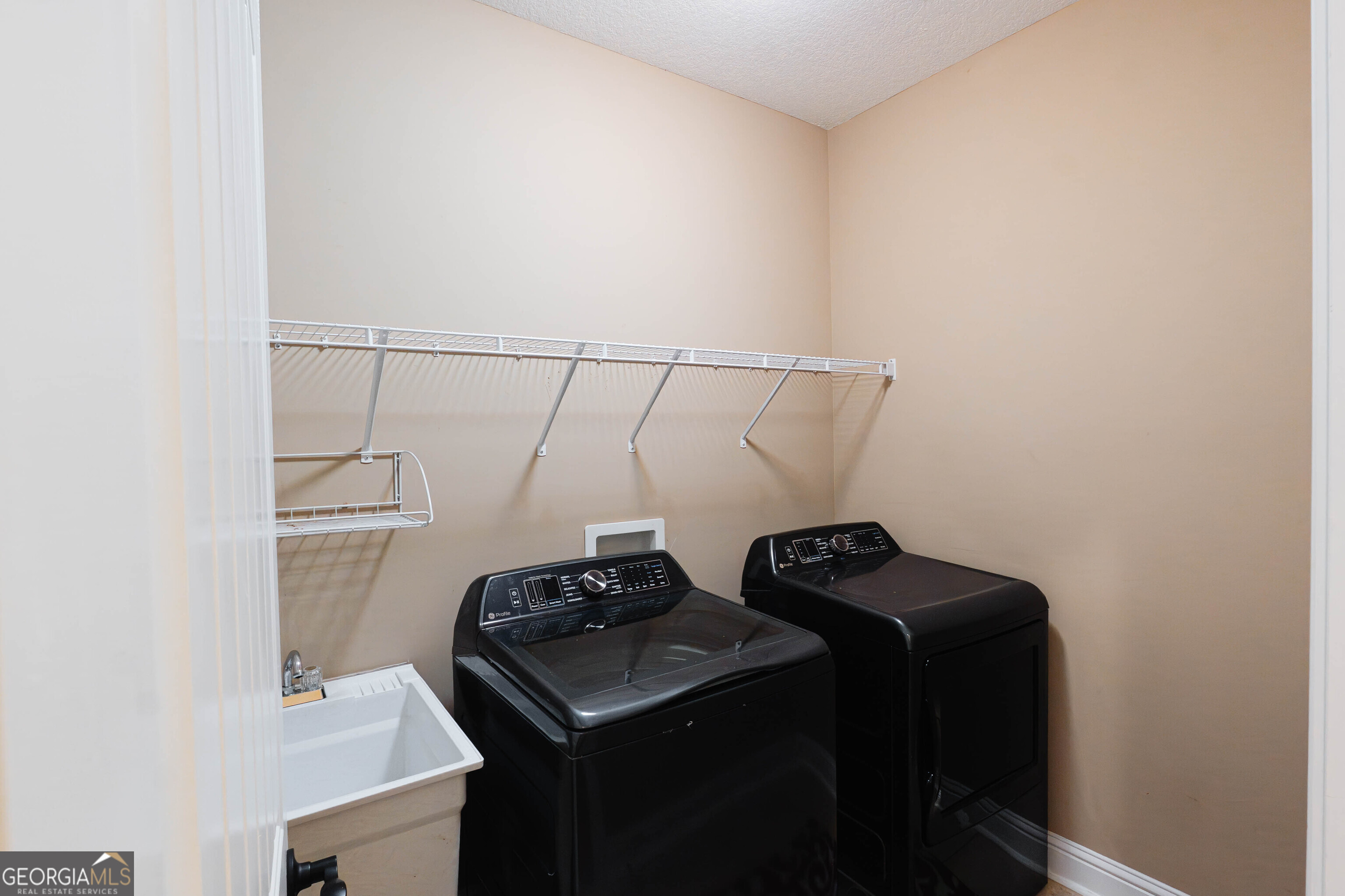 501 Old Bridge Road Warner Robins, GA 31088 - Photo 22 of 54 a view of storage and utility room with utility room