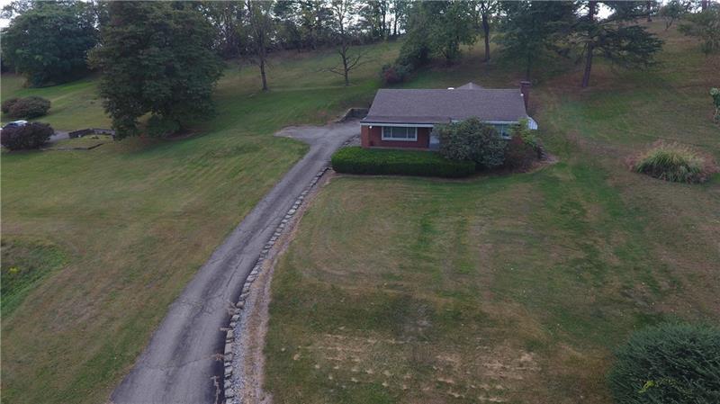 Home is nestled on nearly an acre of private land...
