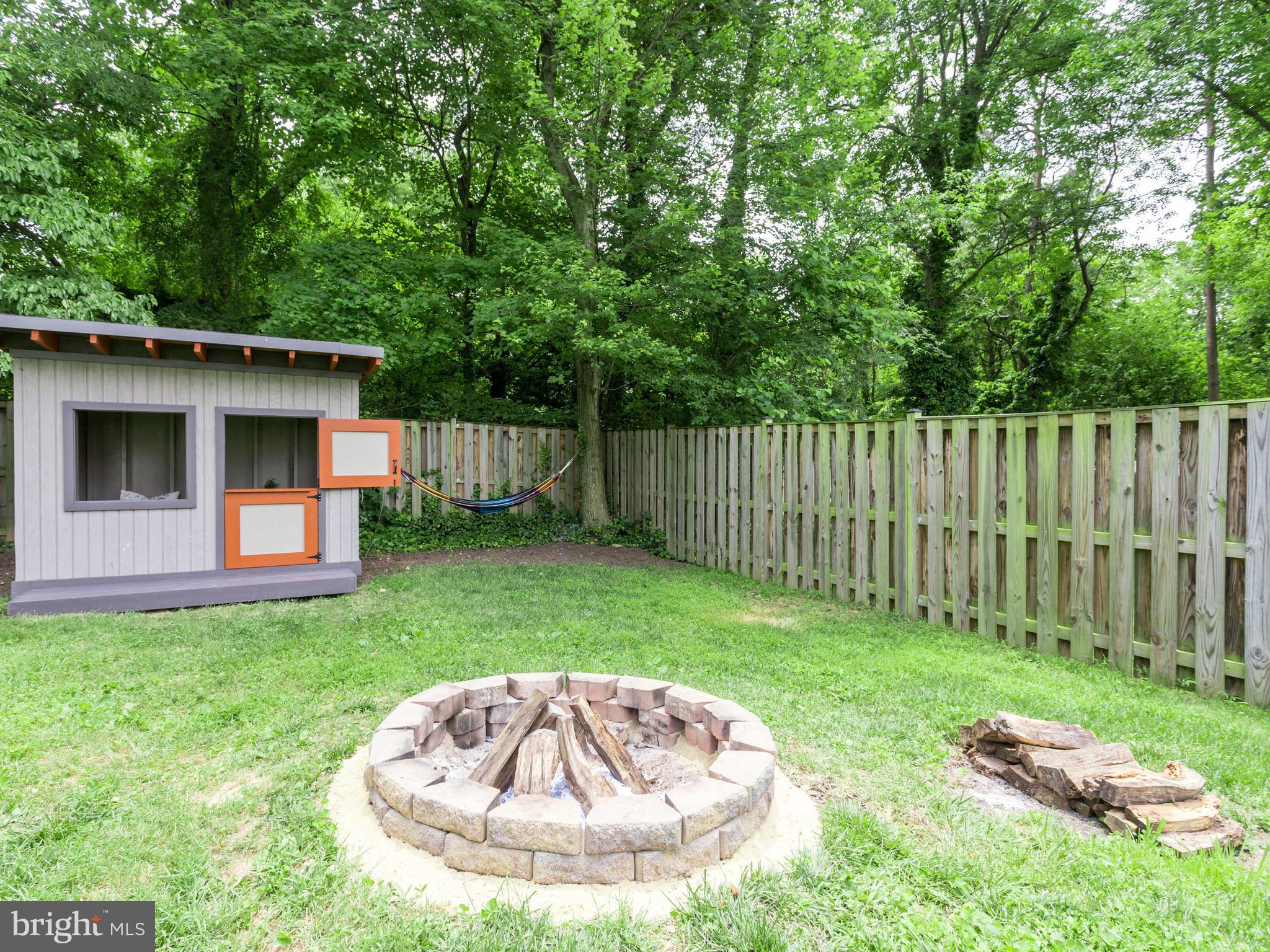 618 Tapawingo Road Southwest Vienna, VA 22180 - Photo 28 of 29 Firepit and custom playhouse covey.
