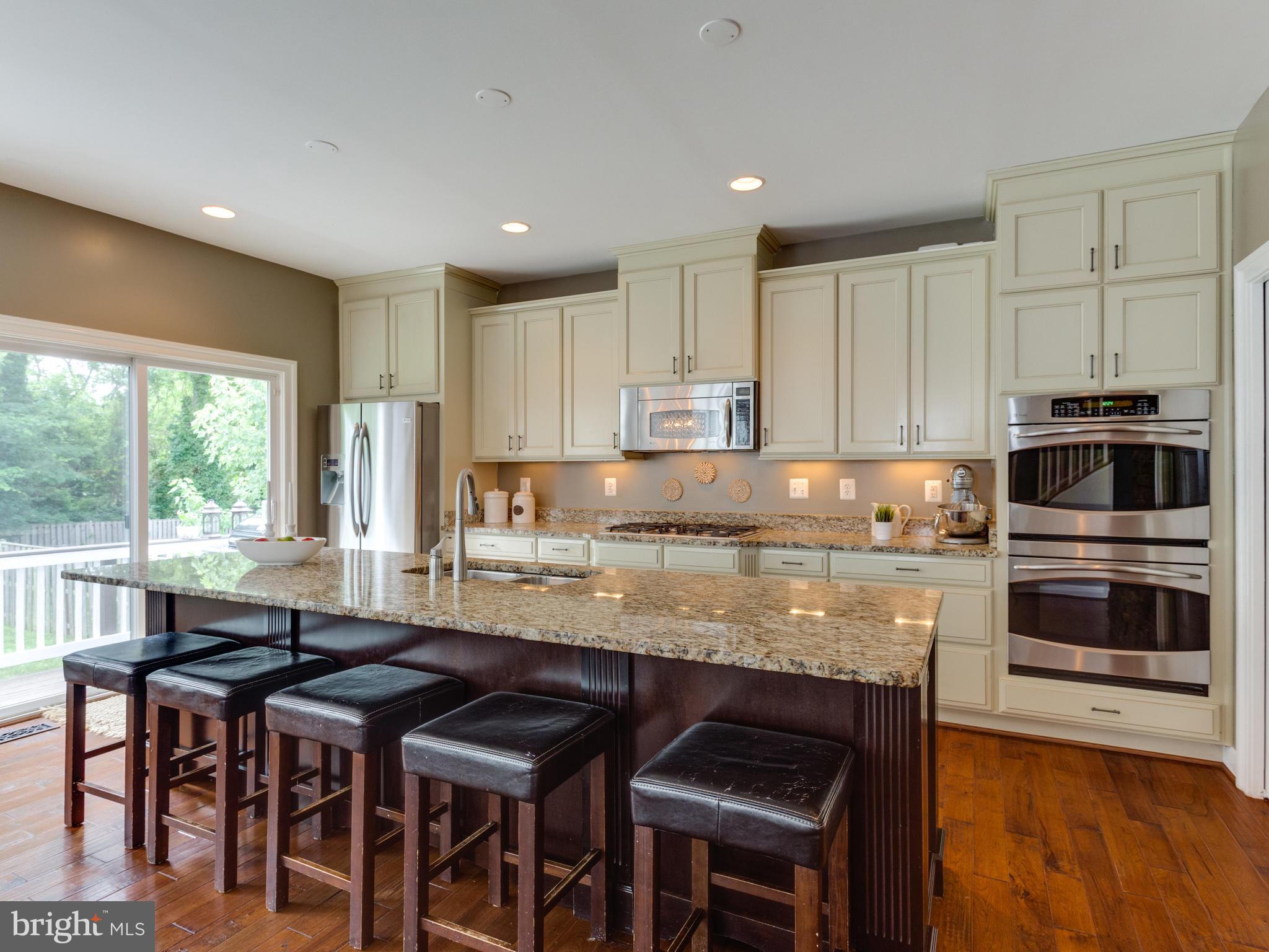 618 Tapawingo Road Southwest Vienna, VA 22180 - Photo 7 of 29 Huge kitchen with granite and stainless.