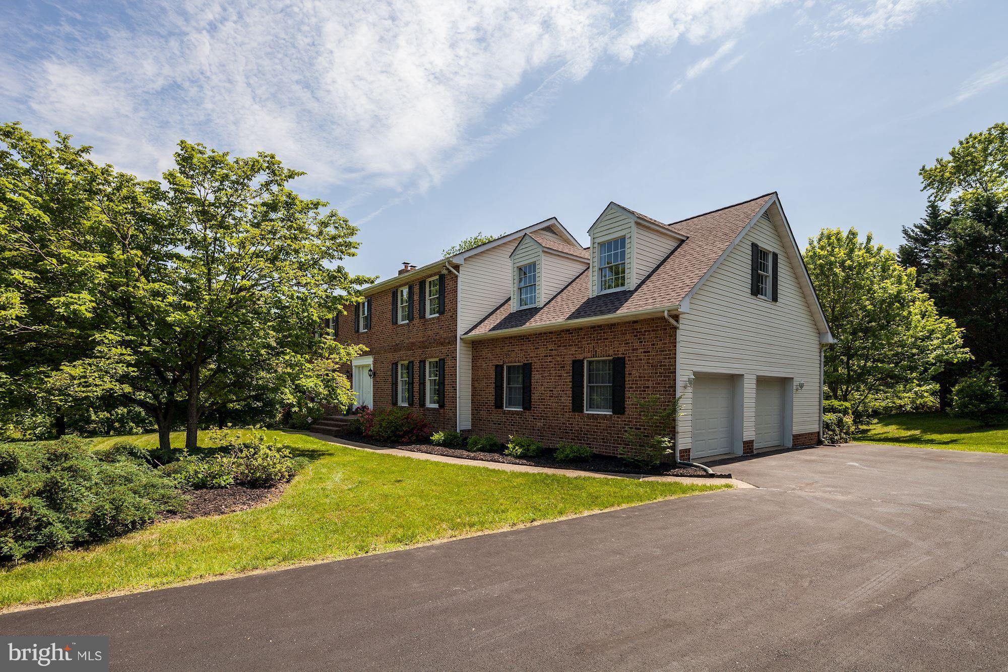 4017 Manor Oaks Road Phoenix, MD 21131 - Photo 28 of 30 2 car garage with blacktop driveway
