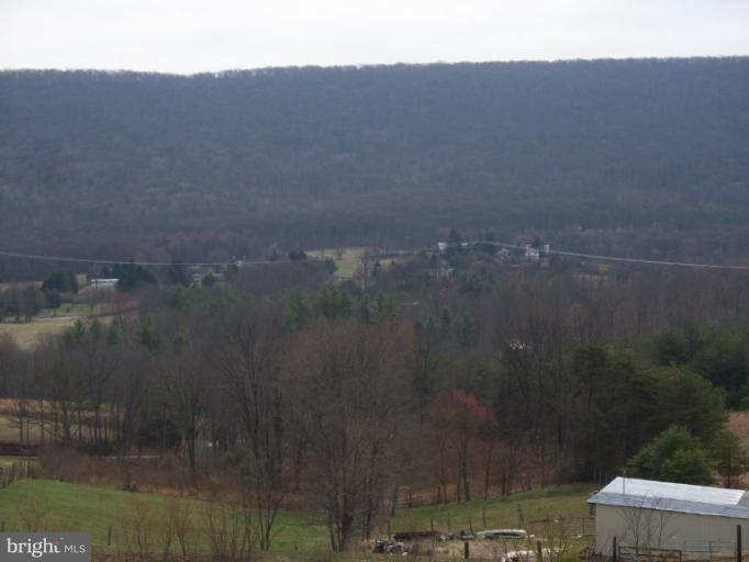 3932 Highland Ridge Road Berkeley Springs, WV 25411 - Photo 28 of 30 a view of a small yard