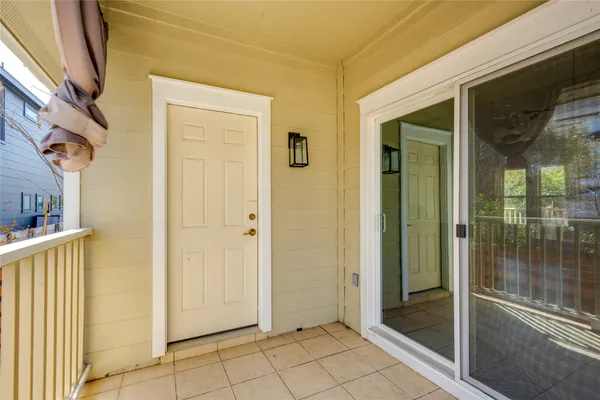 a view of a bathroom with a glass door
