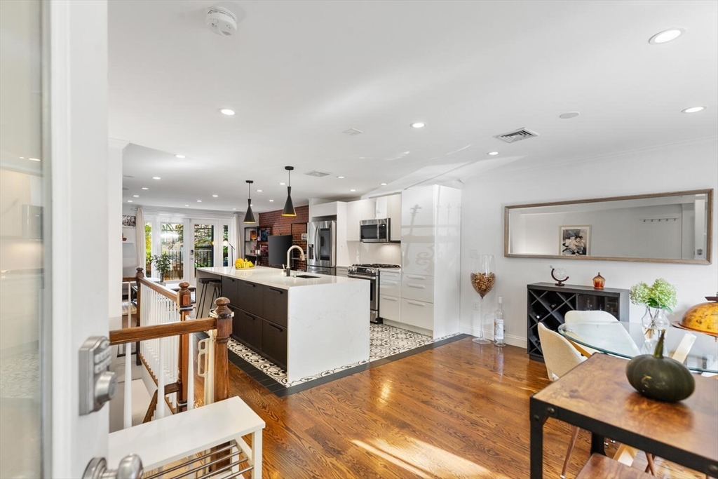 81 Appleton Street, Unit 1 Boston, MA 02116 - Photo 13 of 35 a view of kitchen with cabinets and wooden floor