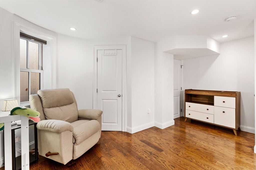 81 Appleton Street, Unit 1 Boston, MA 02116 - Photo 23 of 35 a living room with furniture and a flat screen tv