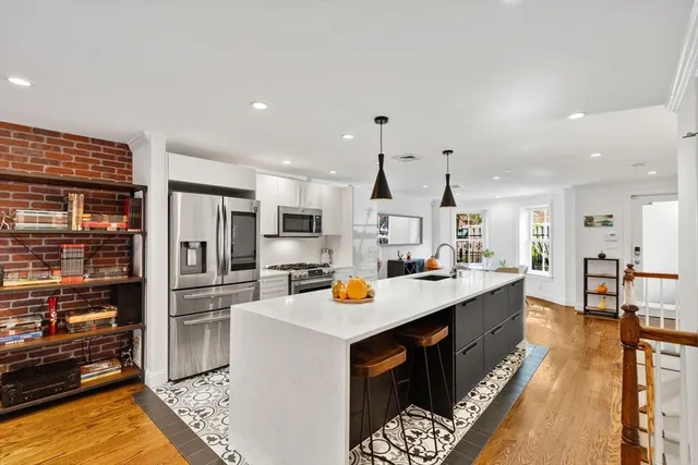 a kitchen view with lot of counter space