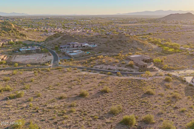 a view of city with ocean
