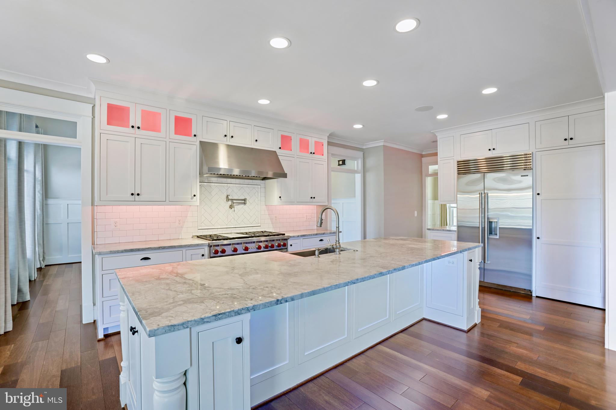 21490 Cedar Drive Sterling, VA 20164 - Photo 15 of 73 a kitchen with stainless steel appliances granite countertop a sink stove and refrigerator