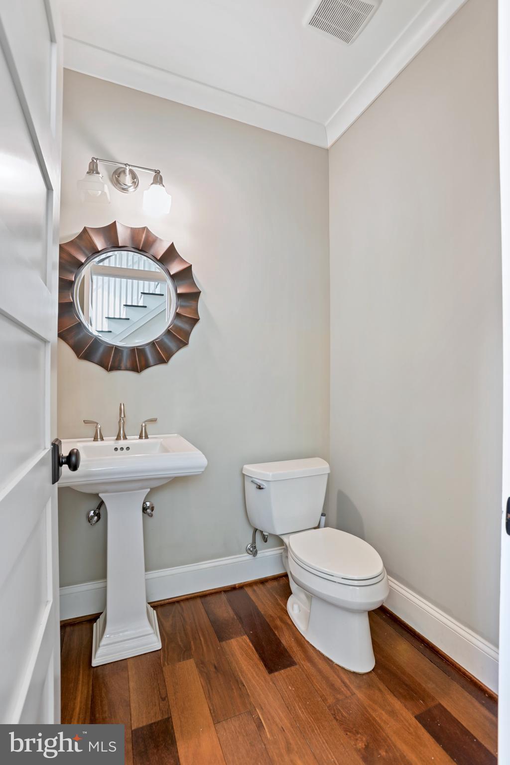 21490 Cedar Drive Sterling, VA 20164 - Photo 22 of 73 a bathroom with a toilet a sink and a mirror