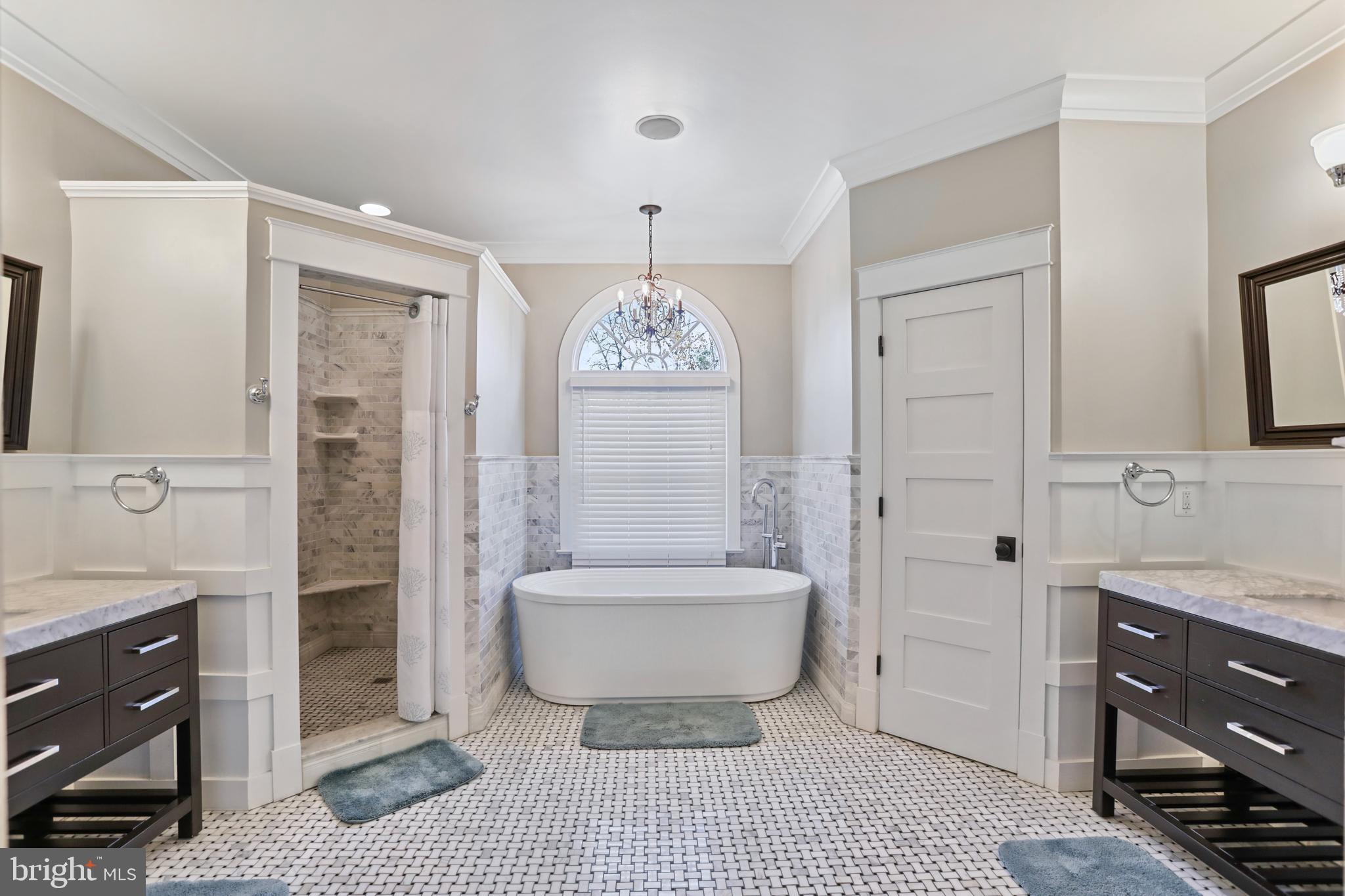 21490 Cedar Drive Sterling, VA 20164 - Photo 26 of 73 a spacious bathroom with a bathtub shower sink mirror and toilet