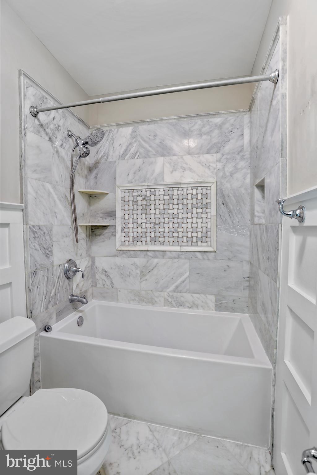 21490 Cedar Drive Sterling, VA 20164 - Photo 38 of 73 a bathroom with a bathtub and a shower
