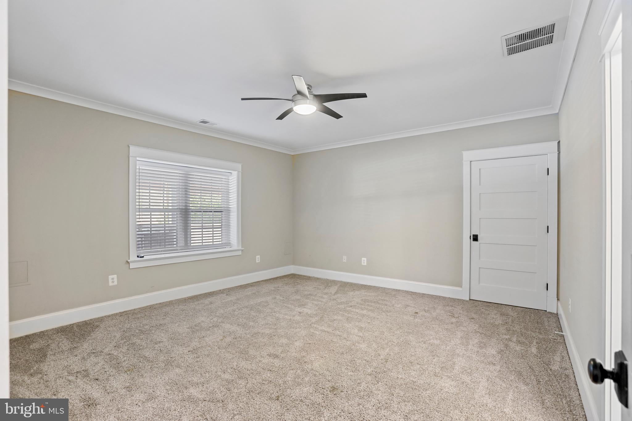 21490 Cedar Drive Sterling, VA 20164 - Photo 40 of 73 a view of an empty room with a window