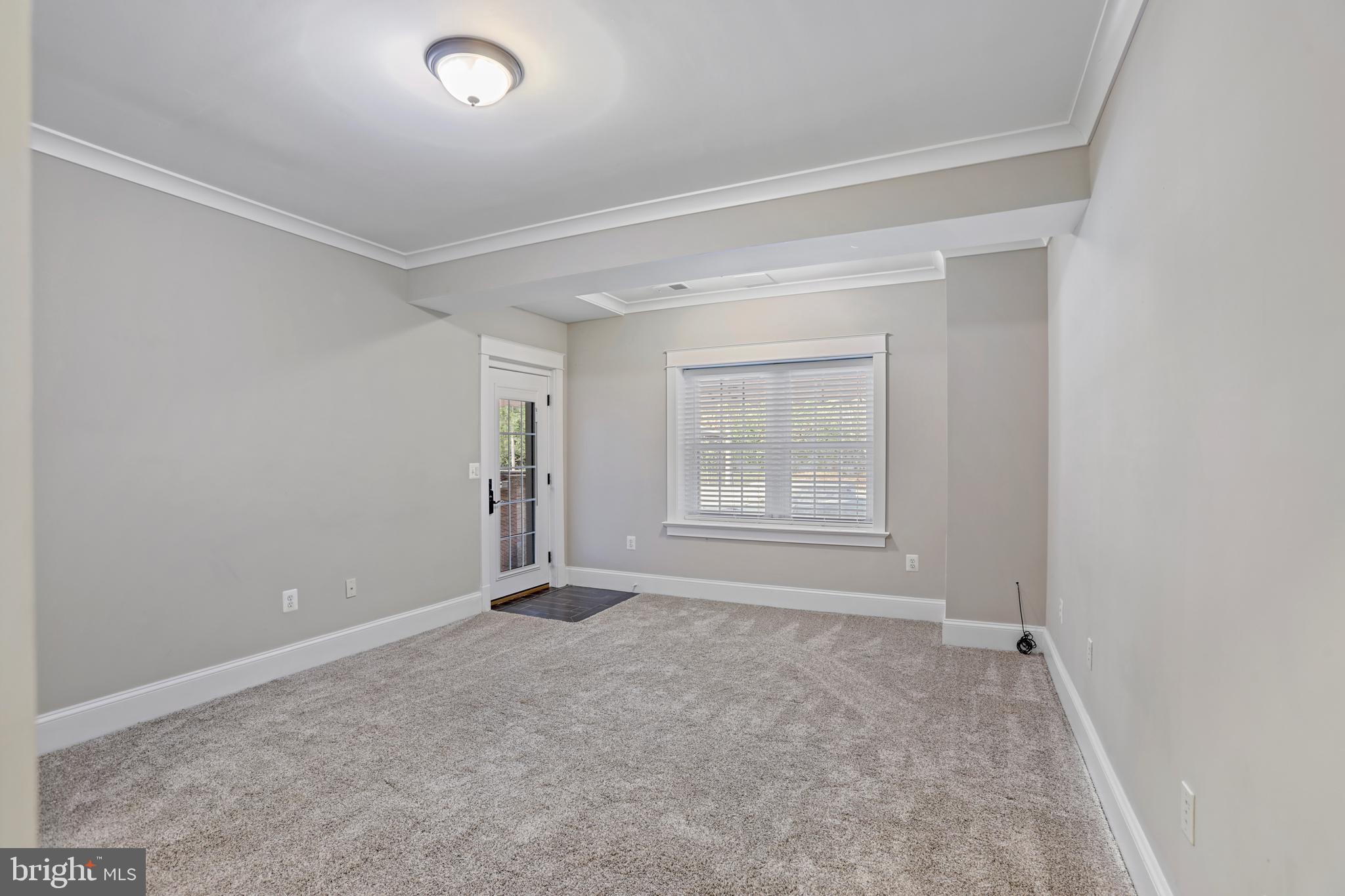 21490 Cedar Drive Sterling, VA 20164 - Photo 41 of 73 an empty room with windows
