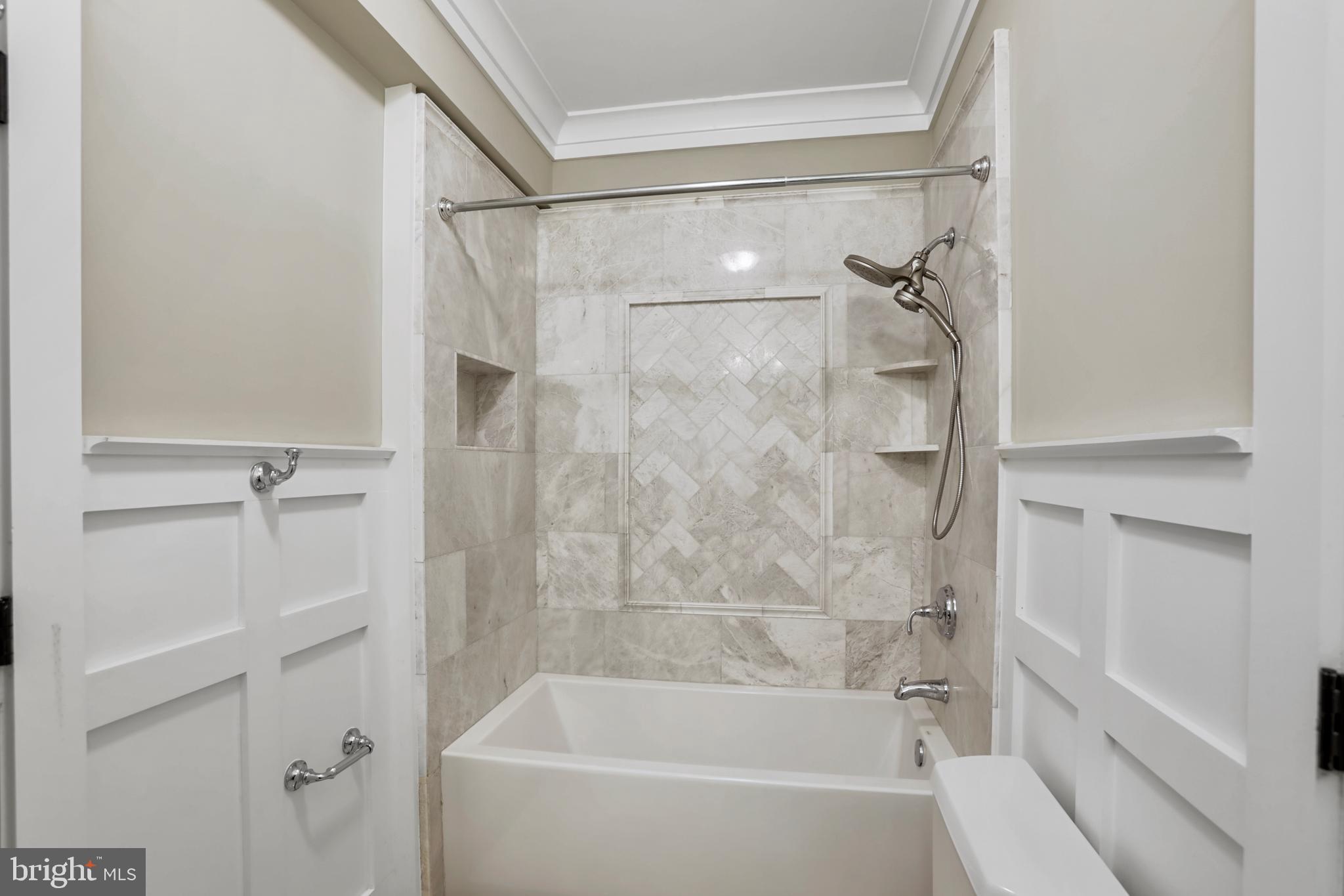 21490 Cedar Drive Sterling, VA 20164 - Photo 44 of 73 a bathroom with a shower and a bath tub