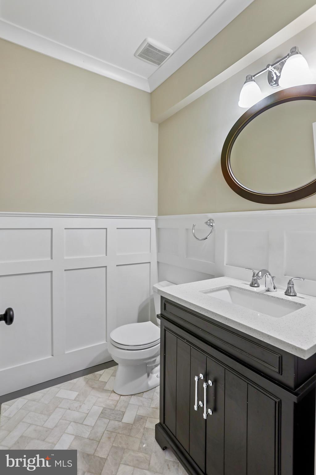 21490 Cedar Drive Sterling, VA 20164 - Photo 45 of 73 a bathroom with a sink a toilet and a mirror