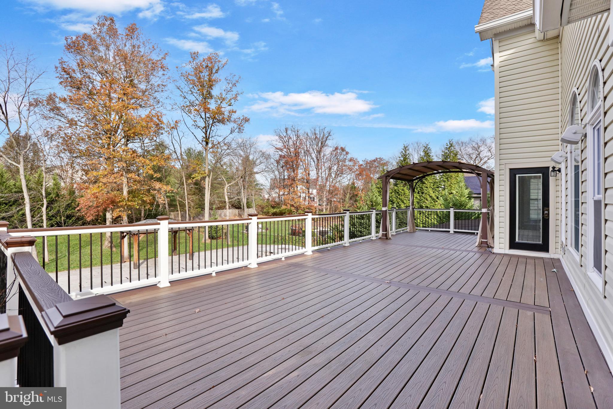 21490 Cedar Drive Sterling, VA 20164 - Photo 52 of 73 a view of a balcony with wooden floor