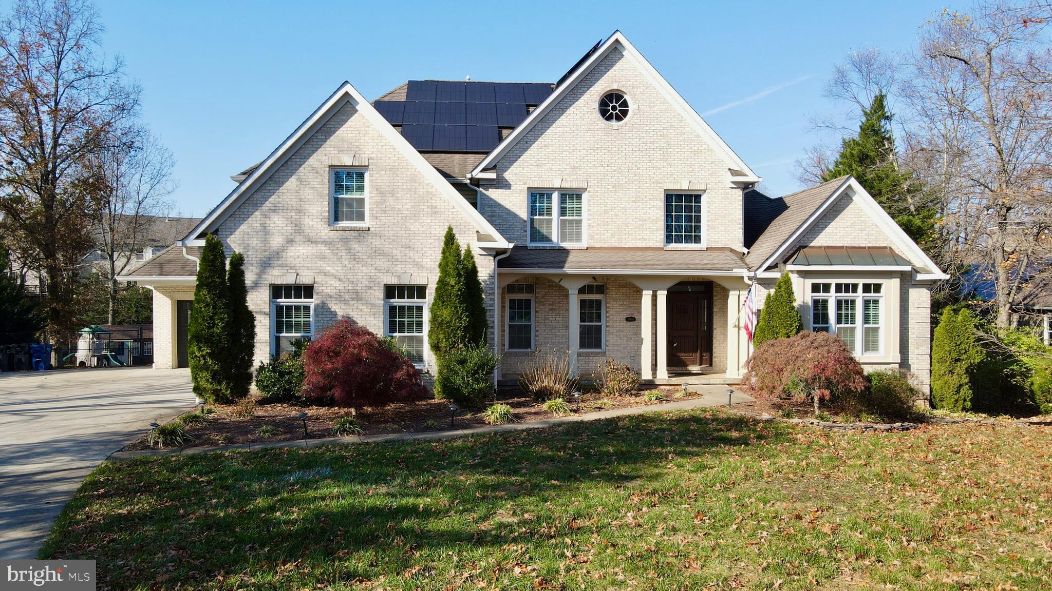 21490 Cedar Drive Sterling, VA 20164 - Photo 59 of 73 a front view of a house with a yard