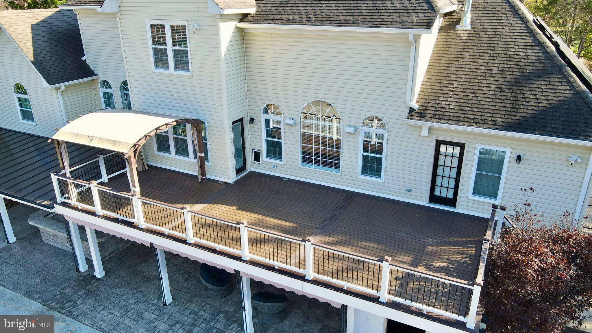 21490 Cedar Drive Sterling, VA 20164 - Photo 67 of 73 a balcony with table and chairs
